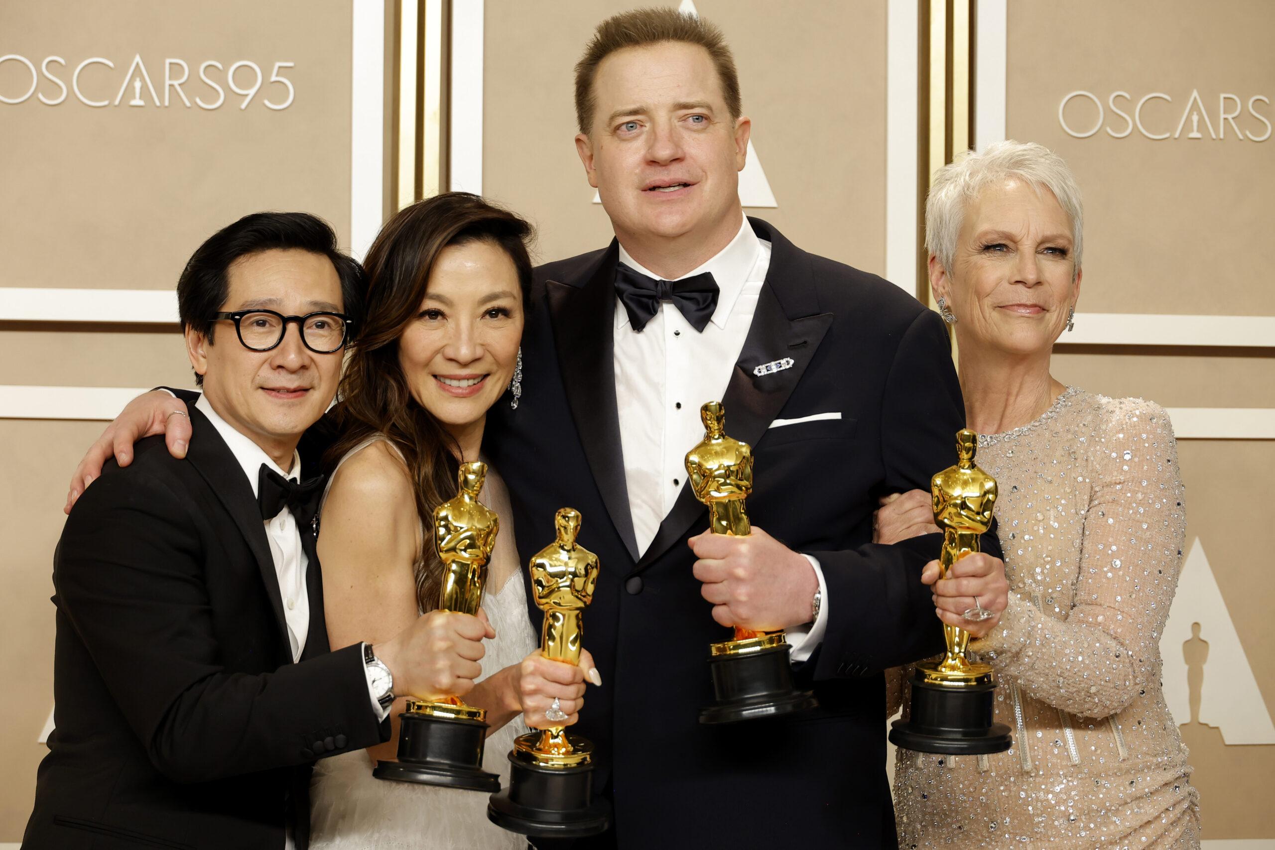 HOLLYWOOD, CALIFORNIA - MARCH 12: Brendan Fraser (second from R), winner of the Best Actor in a Leading Role award for "The Whale," and (L-R) Ke Huy Quan, winner of the Best Actor In A Supporting Role award, Michelle Yeoh, winner of the Best Actress in a Leading Role award and Jamie Lee Curtis, winner of the Best Supporting Actress award for "Everything Everywhere All at Once," pose in the press room during the 95th Annual Academy Awards on March 12, 2023 in Hollywood, California. (Photo by Mike Coppola/Getty Images)