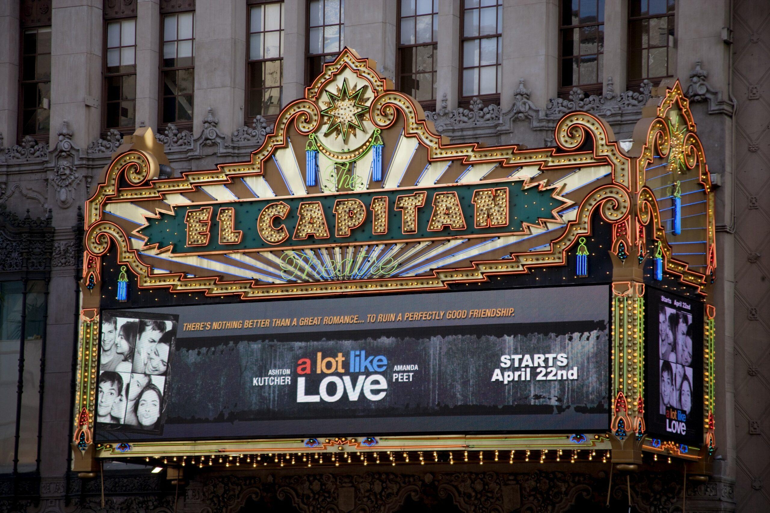El Capitan Theatre Marque. When the theater opened in 1926 as "Hollywood's First Home of Spoken Drama," it featured a Spanish colonial exterior designed by Stiles O. Clements of the architectural firm of Morgan, Walls and Clements, and a lavish East Indian interior by theatre designer G. Albert Lansburgh. For a decade it presented live plays, with over 120 productions by 1936. By the late 1930s, the El Capitan felt the economic effects of the Depression, showcasing fewer and fewer productions.